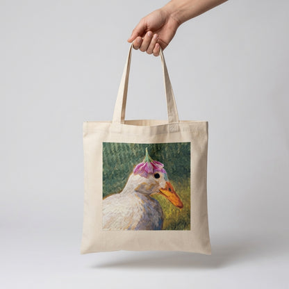 Duck with flower hat tote bag