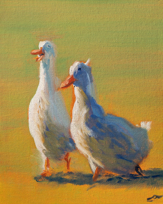 Two ducks standing on a yellow ground with a green background