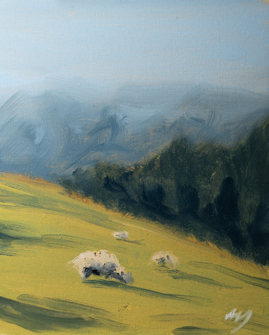 Painting of a landscape with mountains and a field, featuring a signature in the corner.